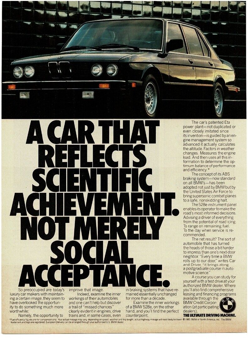 1986 BMW 528e black 4-Door Sedan Vintage Print Ad